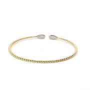 18k yellow gold flex bracelet with 32 round diamonds 0.27tcw