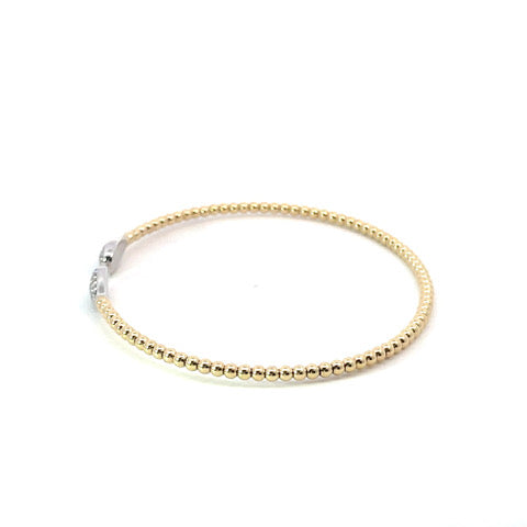 18k yellow gold flex bracelet with 32 round diamonds 0.27tcw