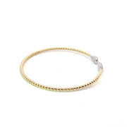 18k yellow gold flex bracelet with 32 round diamonds 0.27tcw